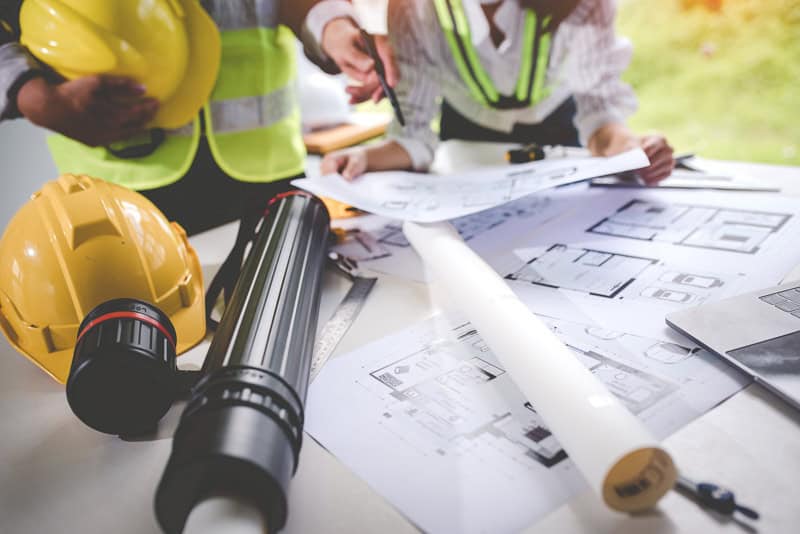 architect concept working architect with blueprin 2026 01 08 08 00 51 utc - Rema Construction