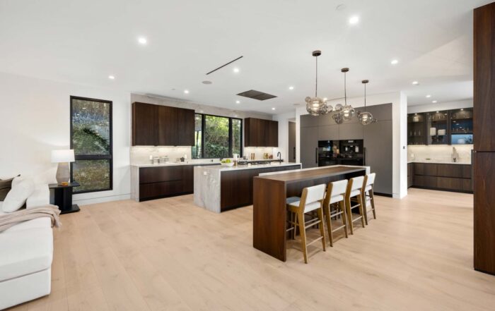 spacious home showcasing wood flooring in kitchen 2026 01 07 07 24 15 utc - Rema Construction