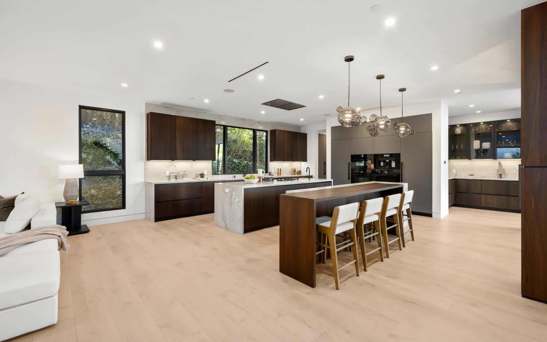 spacious home showcasing wood flooring in kitchen 2026 01 07 07 24 15 utc - Rema Construction